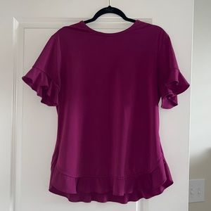 Good condition ruffle hem top